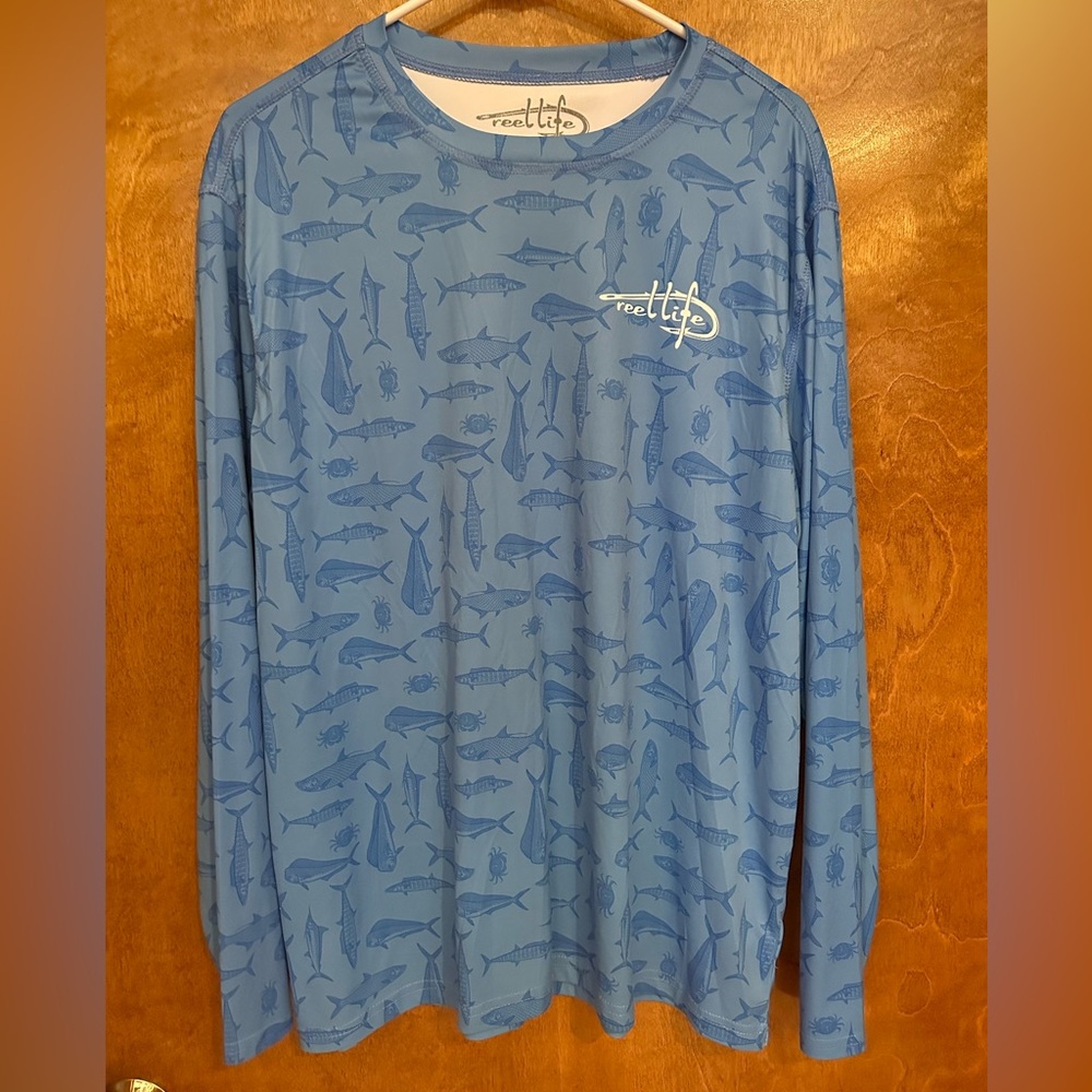 Unisex Reel Life Long Sleeved Performance Tee.